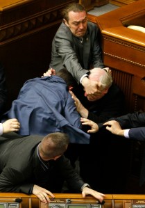 Deputies clash during a session of the parliament in Kiev