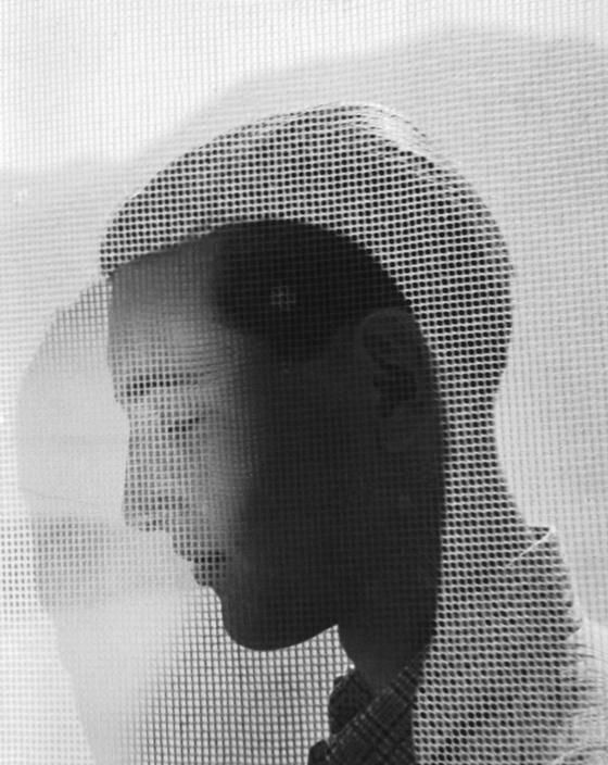 Herbert List, "Boy behind drapes", c. 1934: 1937.jpg